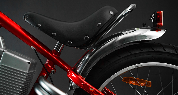 Seat detail of red electric chopper bike